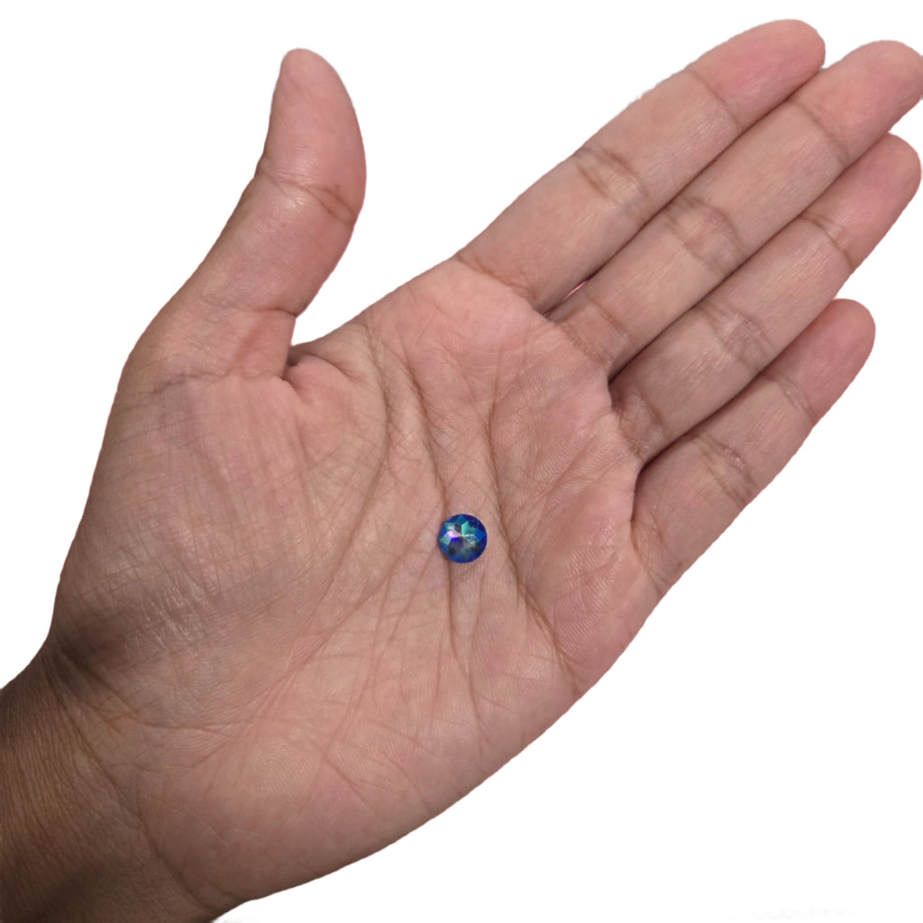 Blue AB round flatback rhinestone, featuring an Aurora Borealis finish, ideal for enhancing carnival costumes and custom designs. #carnivalmw #carnivalsupplies