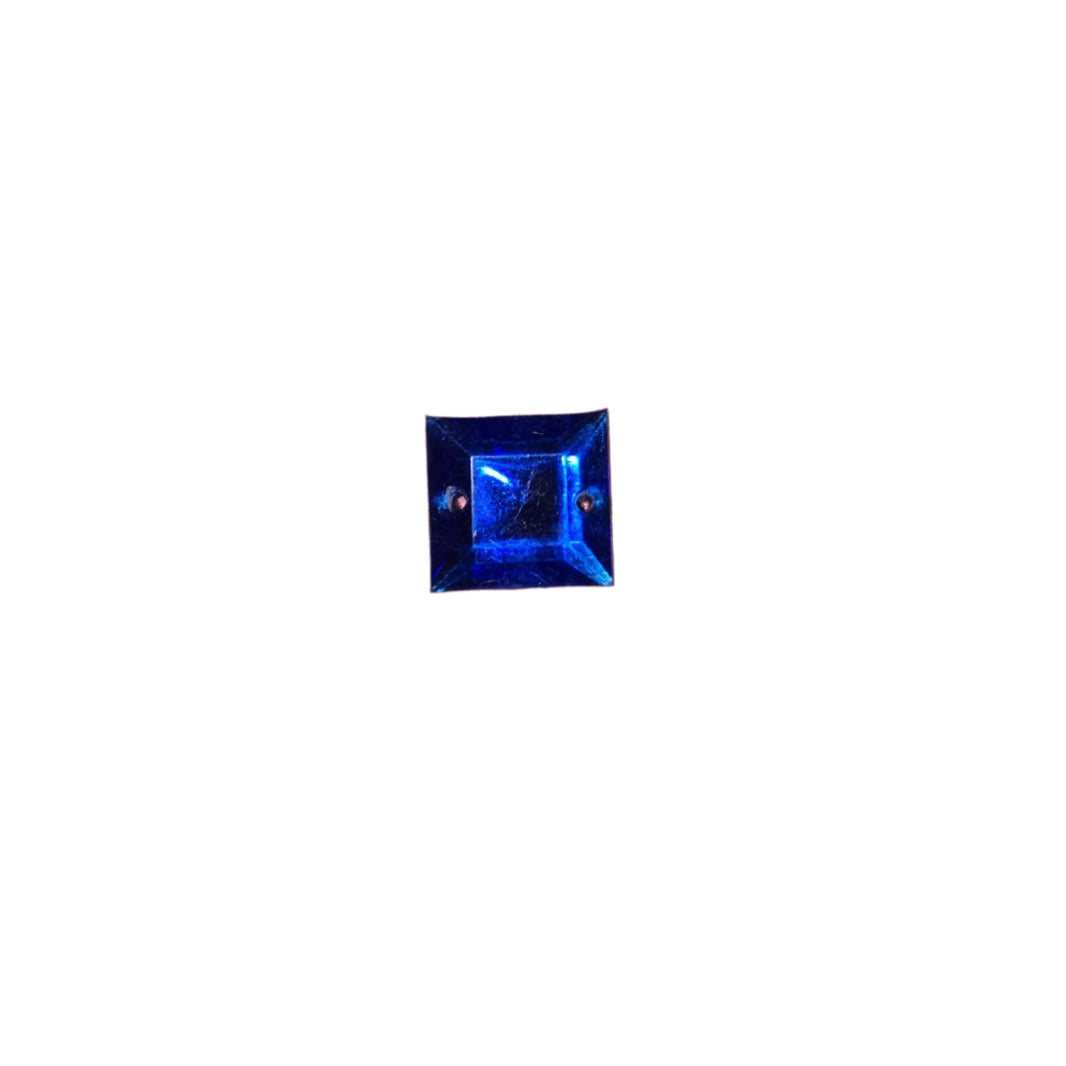 Close-up of a 12mm blue square sew-on rhinestone, perfect for adding sparkle to carnival costumes and custom designs