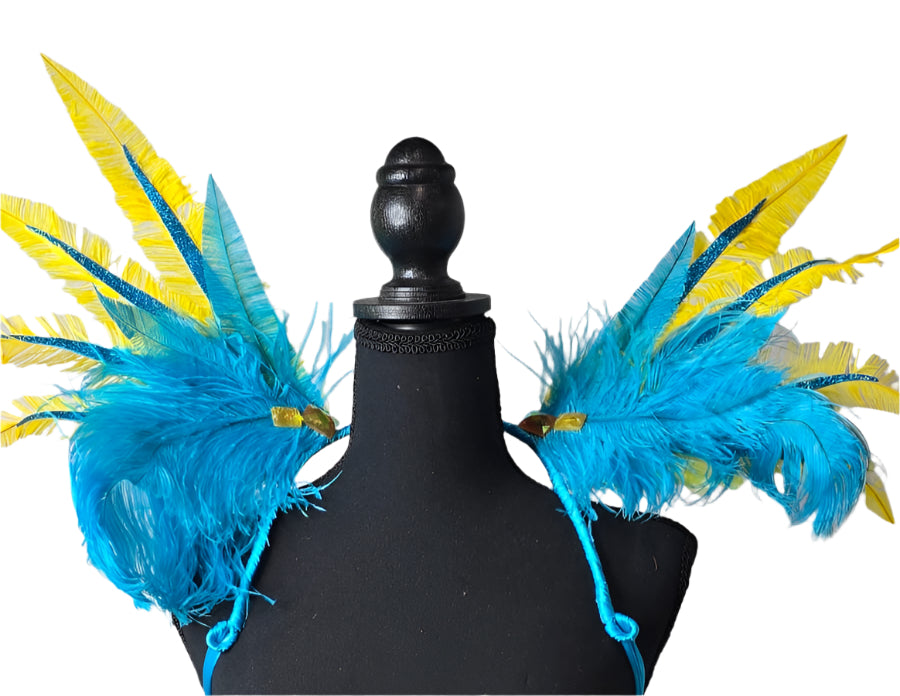 Caribbean Sunrise Feather Small Collar Wings featuring vibrant turquoise blue and sunny yellow feathers with sparkling accents; lightweight, adjustable, and handmade for carnival and festival wear. #CARNIVALFEATHERS #CARNIVAL #CARNIVALCOSTUMES