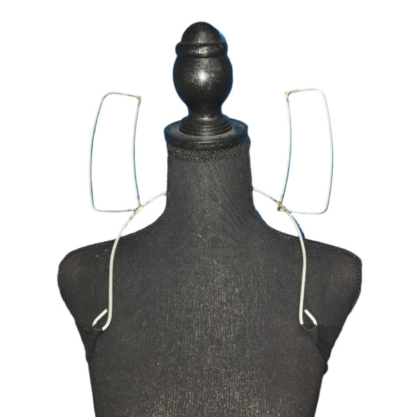 An elevated oblong board designed for carnival backline use, featuring a sturdy wire frame construction. The board is uniquely shaped to enhance the visual appeal of carnival costumes, providing a solid base for vibrant embellishments and decorations. Its lightweight yet durable design ensures ease of movement, making it perfect for dynamic festival performances.  #carnivalmw #carnivalsupplies #carnivalfeathers #carnivalcostume