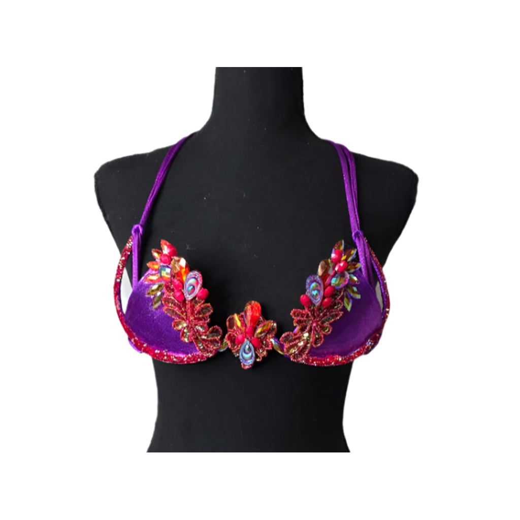 Carnival Orchid Flame Decorated Wire Bra with deep purple fabric, vibrant red and gold floral gem embellishments, and sparkling center crystals, displayed on a black mannequin—perfect for carnival, festivals, and stand-out performances