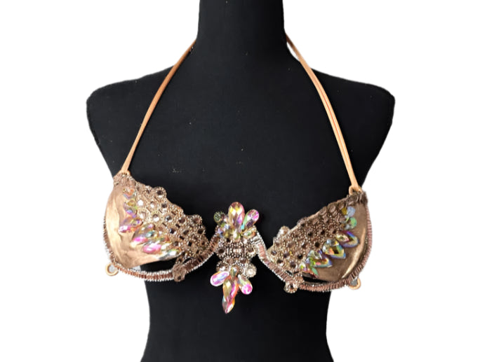 Champagne Radiance Decorated Wire Bra with a champagne-gold base, iridescent crystal petals, and gold beaded details, displayed on a black mannequin—ideal for festivals, carnivals, and glamorous performances. #CarnivalMW #CarnivalReady #WireBra