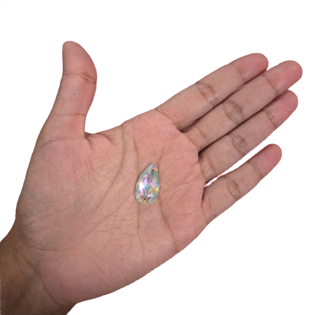 Clear teardrop AB sew-on flatback rhinestone, 16x22MM, perfect for enhancing carnival costumes and custom designs with its sparkling Aurora Borealis finish. #carnivalmw #carnivalsupplies #wirebra