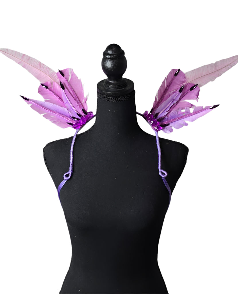 Enchanted Lilac Feather Small Collar Wings featuring soft lilac and lavender feathers with dark-tipped accents; lightweight, adjustable, and handmade for carnival and festival wear. #CARNIVALFEATHERS #CARNIVAL #CARNIVALCOSTUMES