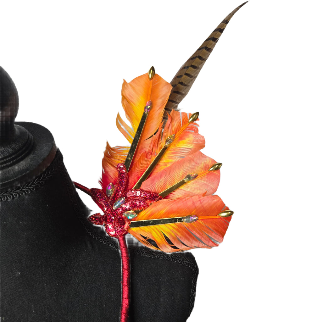 Fiery Sunset Feather Small Collar Wings featuring vibrant orange feathers, shimmering gold accents, and bold red details. Perfectly handcrafted, this lightweight and radiant accessory is designed to sit gracefully around the neck and shoulders, ideal for carnivals, festivals, and performances. #carnivalmw
