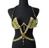 Golden Olive Mirage Decorated Wire Bra featuring olive green cups embellished with gold and iridescent gemstones, a gemstone harness detail, and hanging jewels, displayed on a black mannequin—perfect for festivals, carnivals, and performance wear. #CarnivalMW #FestivalFashion #CarnivalReady #WireBra