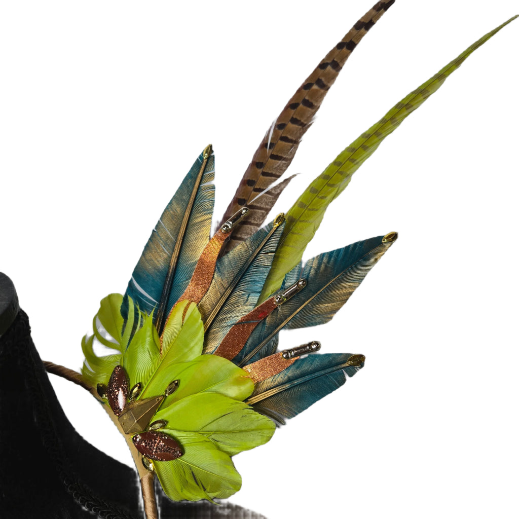 Jungle Luxe Feather Shoulder Wings featuring vibrant green, gold, and earthy-toned feathers, designed for carnivals, festivals, and performances. Lightweight and luxurious, perfect for show-stopping events. #carnivalmw