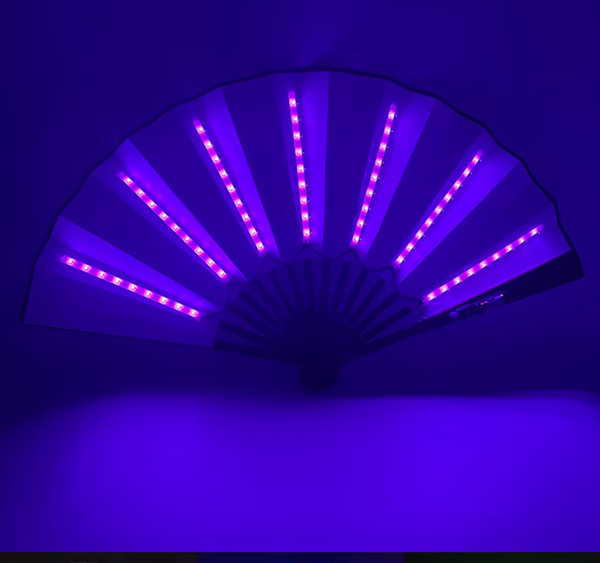 "LED Glow Foldable Hand Fan featuring vibrant glowing LED lights with fluorescent discoloration. Lightweight, foldable, and perfect for festivals, carnivals, and nighttime events. #carnivalmw"