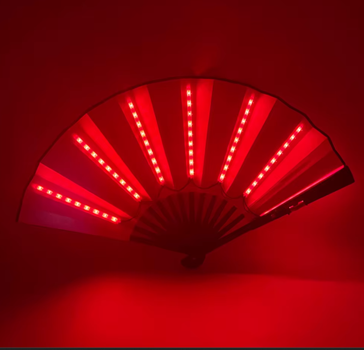 "LED Glow Foldable Hand Fan featuring vibrant glowing LED lights with fluorescent discoloration. Lightweight, foldable, and perfect for festivals, carnivals, and nighttime events. #carnivalmw"