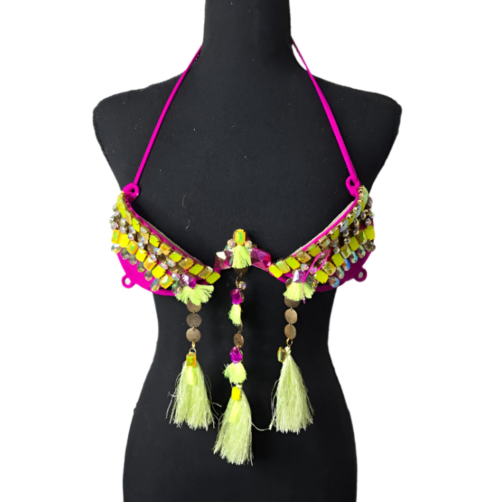 Lime Fiesta Fringe Decorated Wire Bra featuring a neon pink wire base, geometric lime and yellow gem patterns, and cascading neon green tassel fringe, displayed on a black mannequin—perfect for carnivals, samba dancers, and festival performances