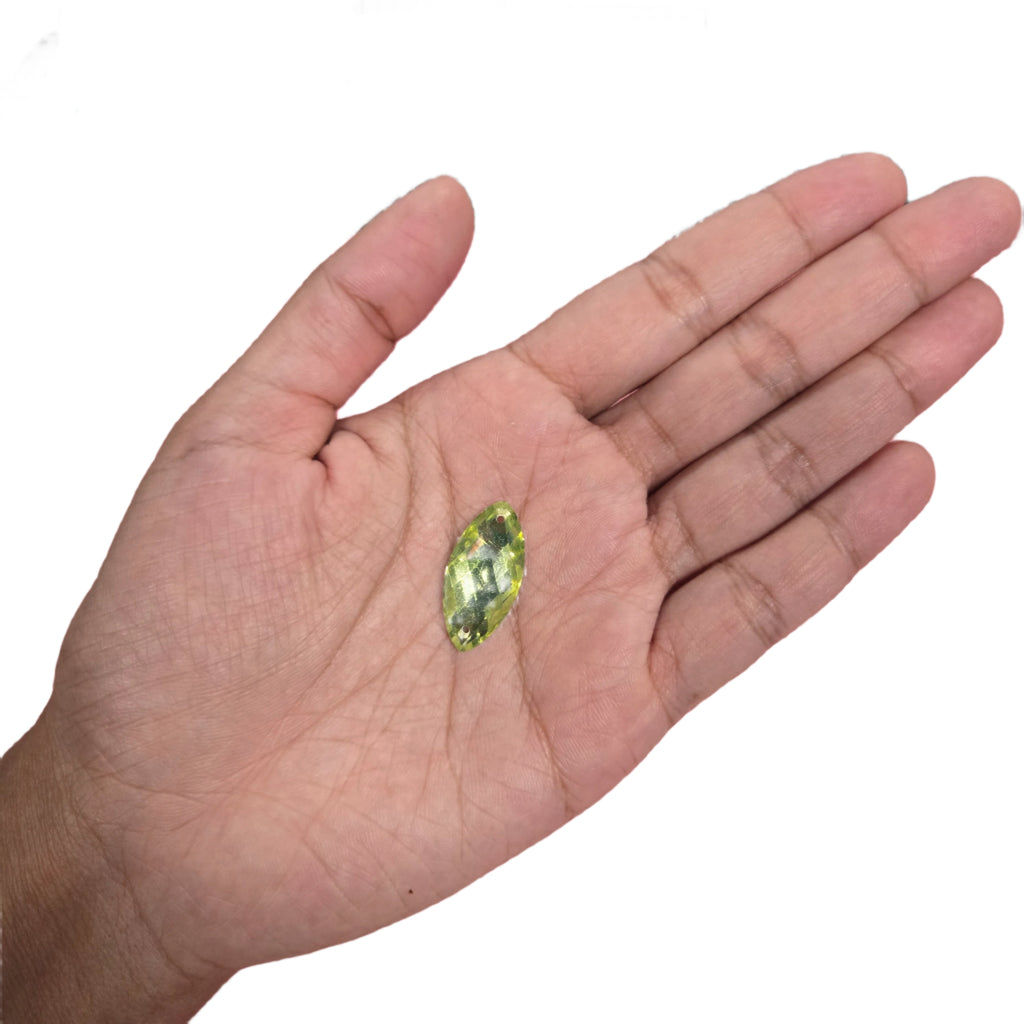 Lime green marquise sew-on flatback rhinestone, 16x22MM, perfect for adding vibrant color to carnival costumes and custom designs. #carnivalmw #carnivalsupplies
