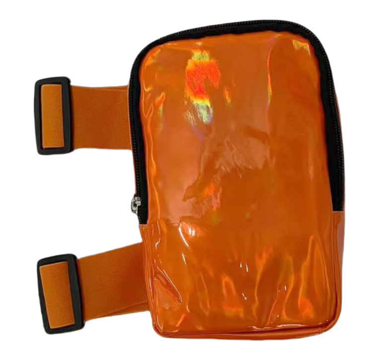 A dazzling holographic thigh bag with adjustable straps, made from high-quality PU leather. Features multiple compartments, a zipper closure, and a waterproof design, perfect for carnivals and festivals. #CarnivalMW #Carnival #Mondaywear #FestivalEssentials #HoloGlamBag