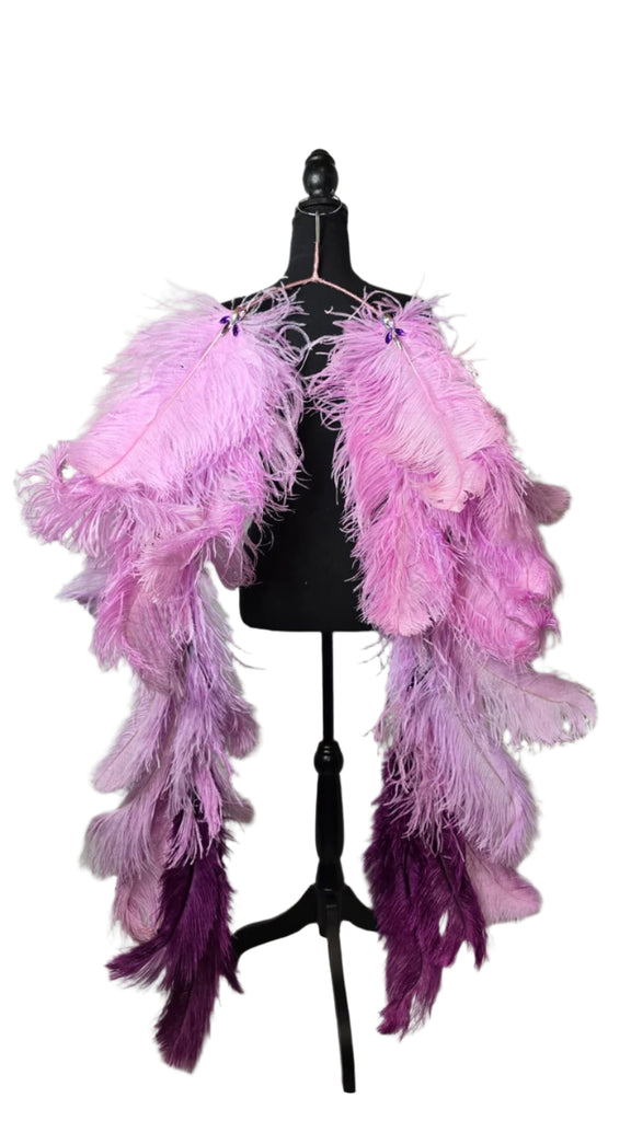 Purple Ombre Feather Tail featuring a stunning gradient of light lavender to deep purple ostrich plumes with sparkling accents; lightweight, adjustable, and handmade to attach easily to any carnival backpack for a dramatic, elegant flair. #CARNIVALFEATHERS #CARNIVAL #CARNIVALCOSTUMES
