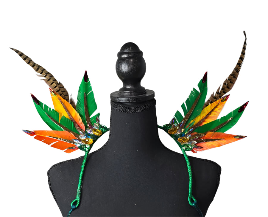 Rainforest Radiance Feather Small Collar Wings featuring a vibrant mix of green, orange, yellow, and brown feathers with intricate embellishments; lightweight, adjustable, and handmade for carnival and festival wear. #CARNIVALFEATHERS #CARNIVAL #CARNIVALCOSTUMES