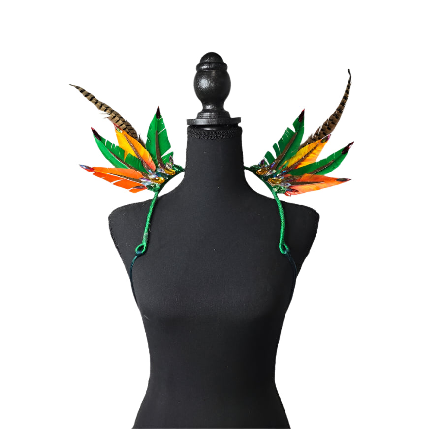 Rainforest Radiance Feather Small Collar Wings featuring a vibrant mix of green, orange, yellow, and brown feathers with intricate embellishments; lightweight, adjustable, and handmade for carnival and festival wear. #CARNIVALFEATHERS #CARNIVAL #CARNIVALCOSTUMES