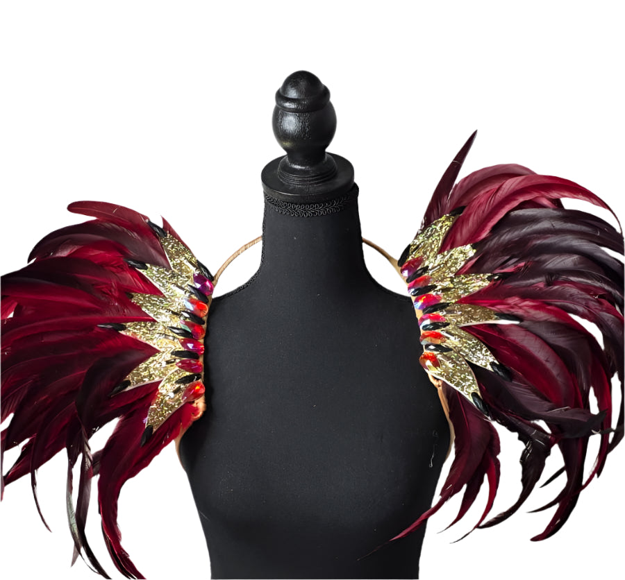 Regal Ruby Feather Small Collar Wings featuring a dramatic blend of deep burgundy and gold feathers with sparkling embellishments; lightweight, adjustable, and handmade for carnival and festival wear. #CARNIVALFEATHERS #CARNIVAL #CARNIVALCOSTUMES
