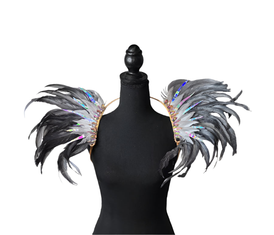 Silver Shadow Feather Small Collar Wings featuring a dramatic blend of black, silver, and iridescent feathers with sparkling embellishments; lightweight, adjustable, and handmade for carnival and festival wear. #CARNIVALFEATHERS #CARNIVAL #CARNIVALCOSTUMES