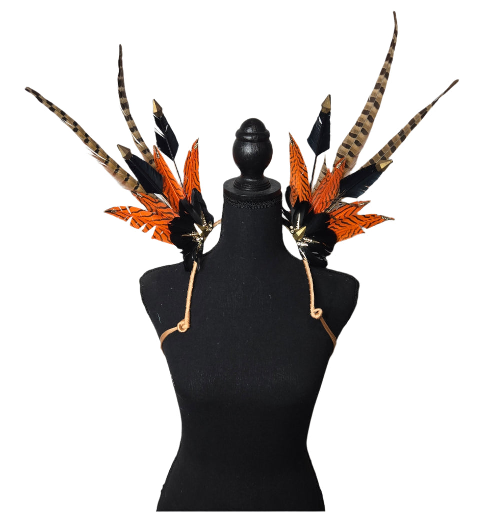 A vibrant set of Sparkling Blue Feather Small Collar Wings displayed on a mannequin. The wings feature bold blue feathers adorned with shimmering gem accents, creating a radiant and eye-catching design. Perfect for carnivals, festivals, and performances, the wings are lightweight and stylish, adding a touch of glamour to any outfit. #carnivalmw