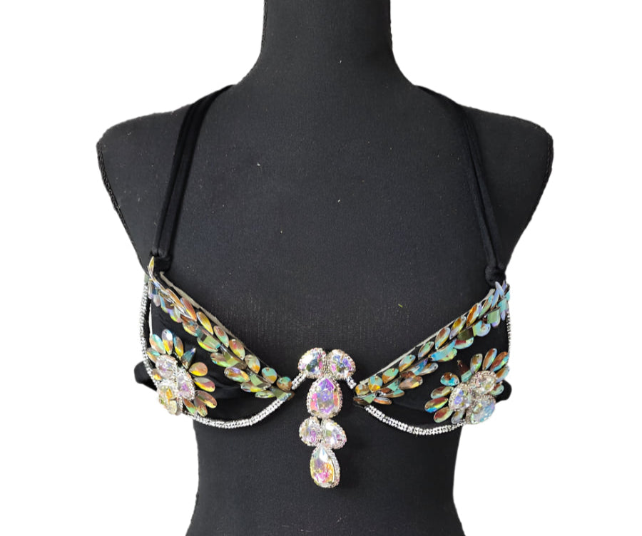Starlight Bloom Decorated Wire Bra featuring iridescent crystal and gemstone floral motifs on a wire frame, displayed on a black mannequin—perfect for carnivals, festivals, and show-stopping performances. #CarnivalMW #FestivalFashion #CarnivalReady #WireBra