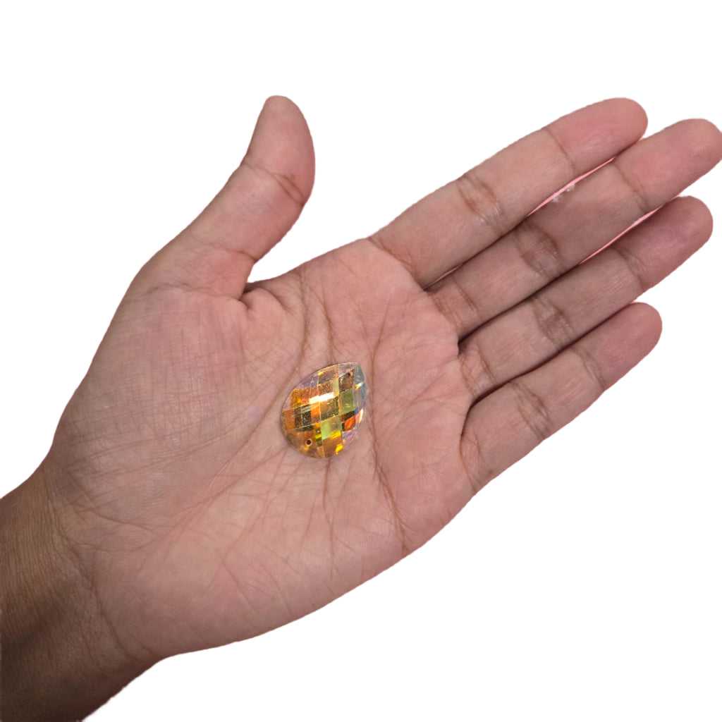Yellow teardrop AB sew-on flatback rhinestone, 18x26MM, featuring an Aurora Borealis finish, perfect for enhancing carnival costumes and custom designs. #carnivalmw #carnivalsupplies