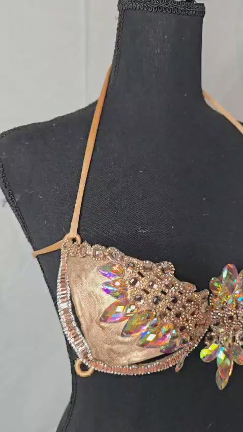 Champagne Radiance Decorated Wire Bra with a champagne-gold base, iridescent crystal petals, and gold beaded details, displayed on a black mannequin—ideal for festivals, carnivals, and glamorous performances. #CarnivalMW #CarnivalReady #WireBra