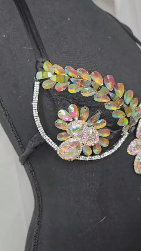 Starlight Bloom Decorated Wire Bra featuring iridescent crystal and gemstone floral motifs on a wire frame, displayed on a black mannequin—perfect for carnivals, festivals, and show-stopping performances. #CarnivalMW #FestivalFashion #CarnivalReady #WireBra