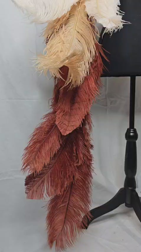 Desert Sands Feather Plume Tail featuring an elegant ombré blend of cream, tan, and rich brown ostrich feathers with sparkling accents; lightweight, adjustable, and handmade to attach easily to any carnival backpack for a dramatic, earthy flair. #CARNIVALFEATHERS #CARNIVAL #CARNIVALCOSTUMES