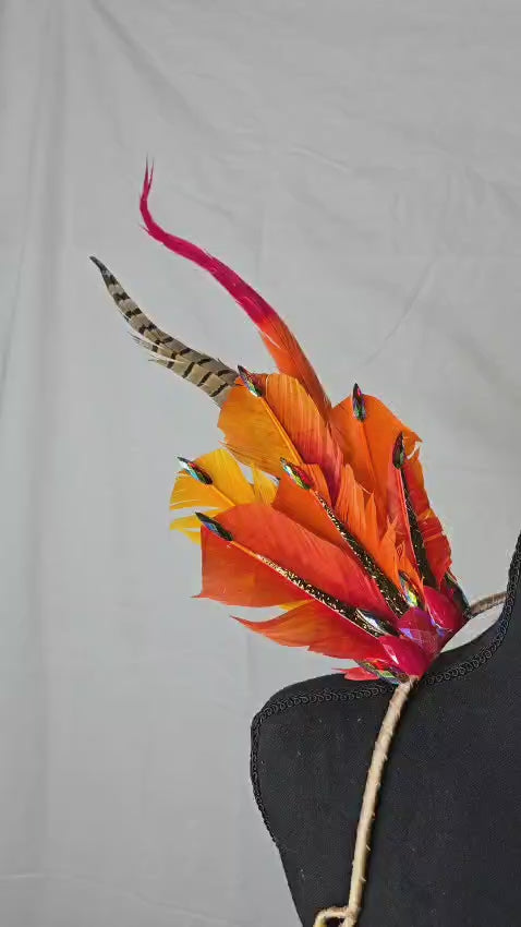 Phoenix Fire Feather Small Collar Wings featuring a fiery blend of vivid orange, red, and golden yellow feathers with dramatic plumes and sparkling embellishments; lightweight, adjustable, and handmade for carnival and festival wear. #CARNIVALFEATHERS #CARNIVAL #CARNIVALCOSTUMES