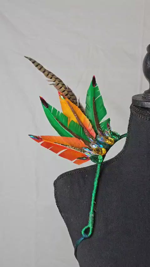 Rainforest Radiance Feather Small Collar Wings featuring a vibrant mix of green, orange, yellow, and brown feathers with intricate embellishments; lightweight, adjustable, and handmade for carnival and festival wear. #CARNIVALFEATHERS #CARNIVAL #CARNIVALCOSTUMES