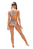 Women in Nine-Mile Asymmetrical Two-Piece Bikini Swimsuit. Designer Keva J., Back view full.
